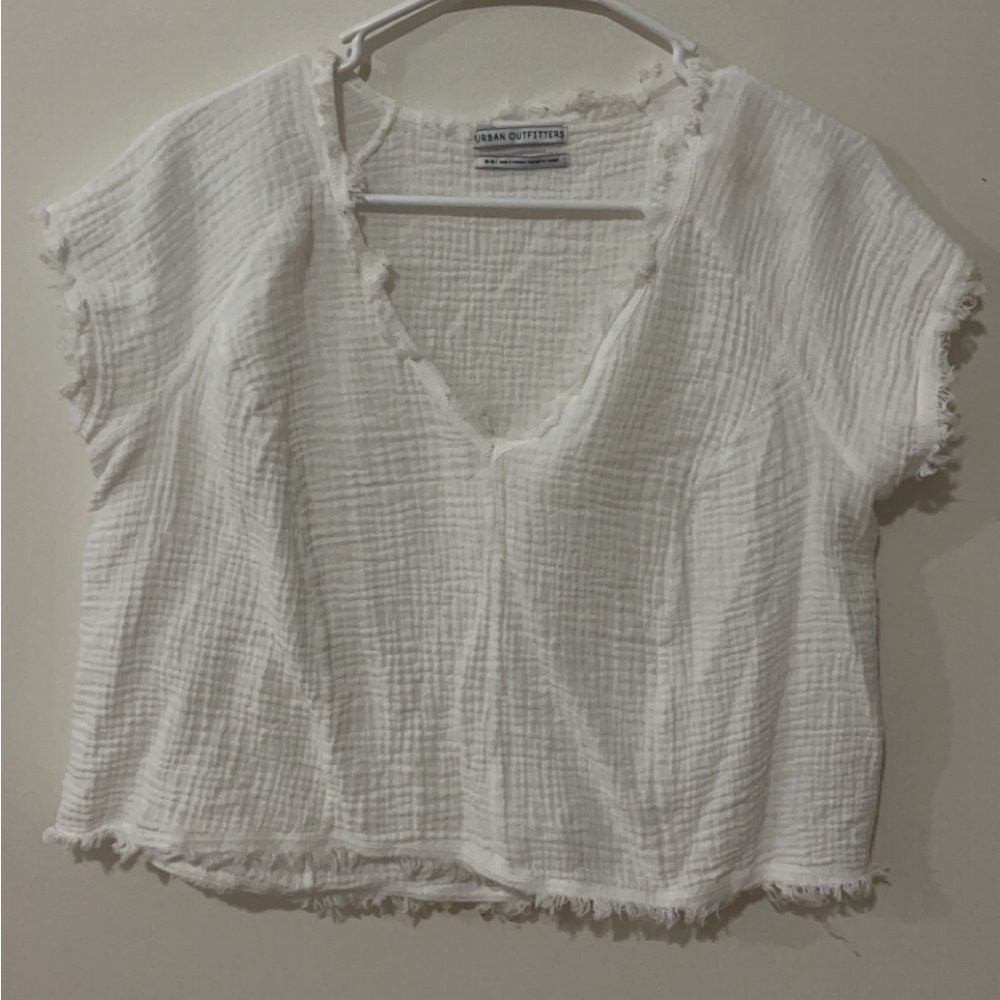 Urban outfitters white fringe top. Worn couple of times. Great condition.